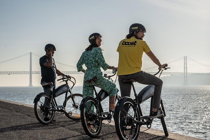 Belém E-Bike Guided Tour Explore Lisbon by the river - Under the 25 de Abril Bridge