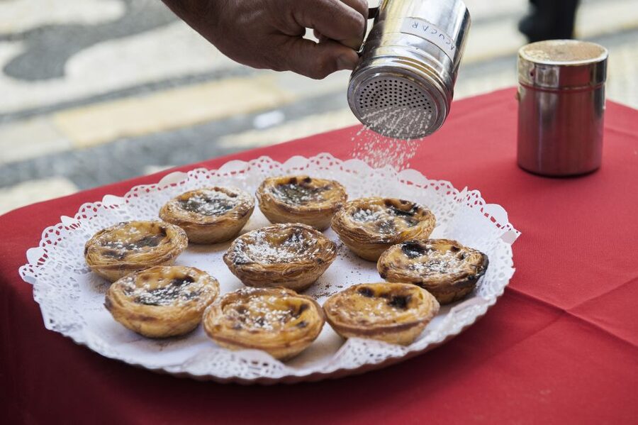 Best of Lisbon Walking Tour: Rossio, Chiado & Alfama - The Alfama tasting adds a local pause