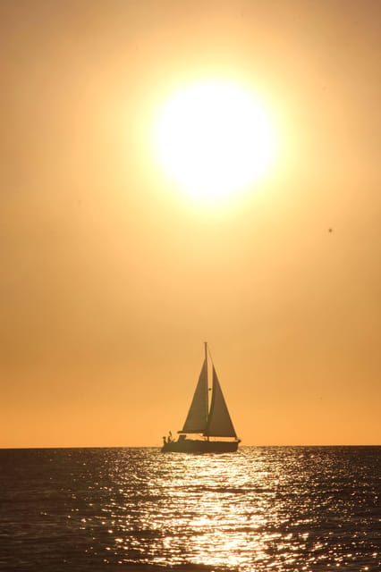 ⛵Bluemotion Lisbon⛵: Sunset sailing tour in Tagus River - Commerce Square and Alfama from the river