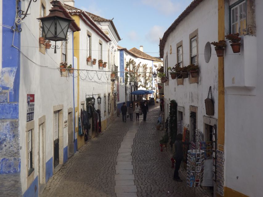 From Lisbon: Alcobaça & Óbidos Self-Guided Tour - Churches, tiles, and royal connections