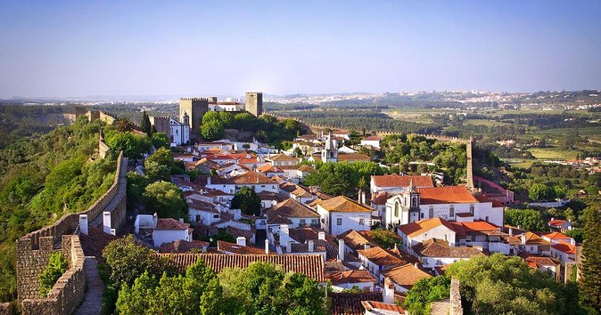 From Lisbon: Fátima, Nazaré, Batalha, and Óbidos Guided Tour - Óbidos: the prettiest finish