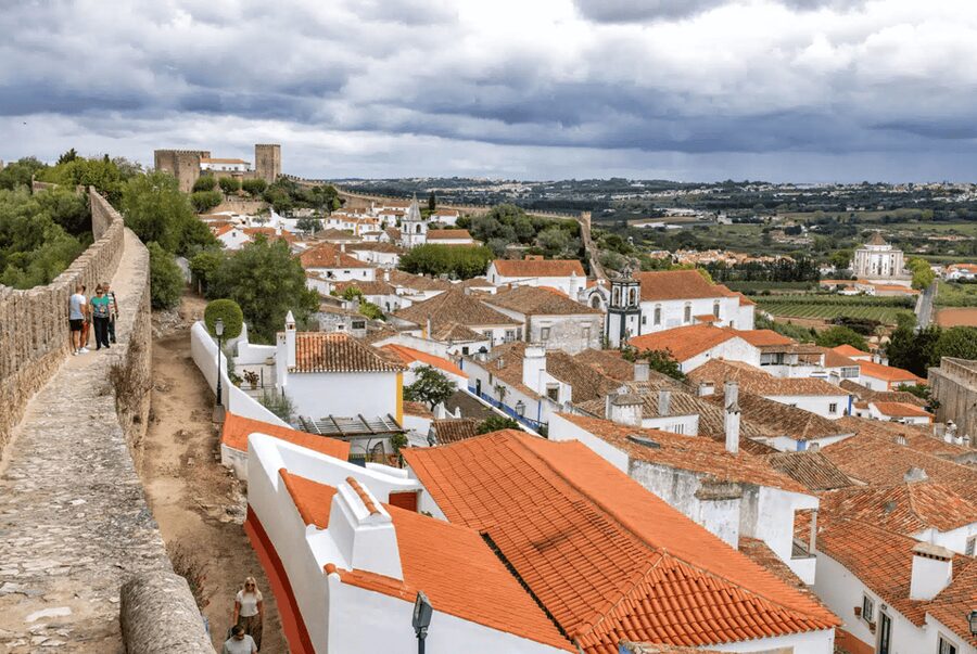 From Lisbon: Nazare Big Waves and Óbidos Guide Day Trip - Why Nazaré Makes the First Stop Worthwhile