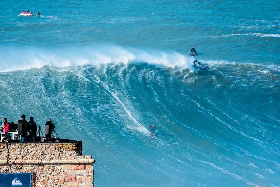 From Lisbon: Nazare Big Waves and Óbidos Guide Day Trip - Seeing Nazaré From the Lighthouse to the Fishing Waterfront
