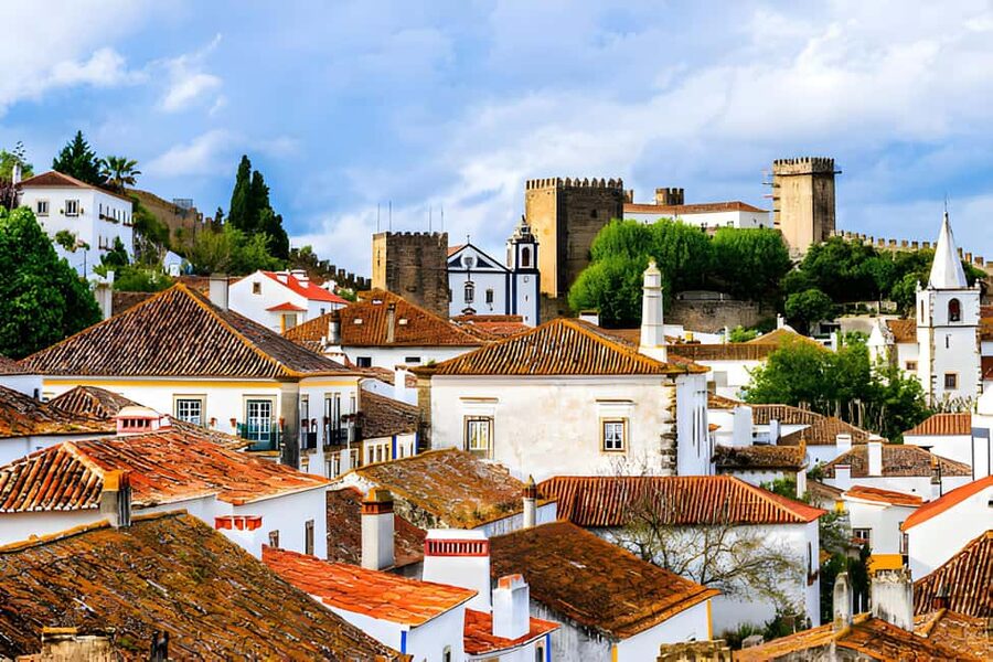 From Lisbon: Obidos, Nazaré and Fátima Small Group Tour - Nazaré: a working fishing town with enormous waves