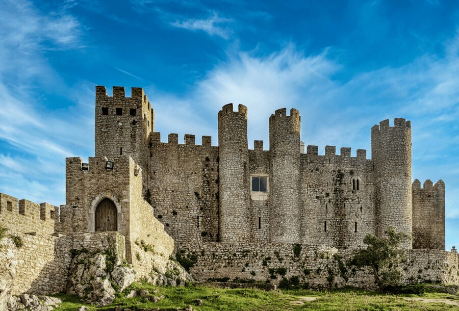 From Lisbon: Tour to Óbidos and Nazaré - Medieval Village, Sour Cherry and Iconic Beaches - Walking the Óbidos ramparts