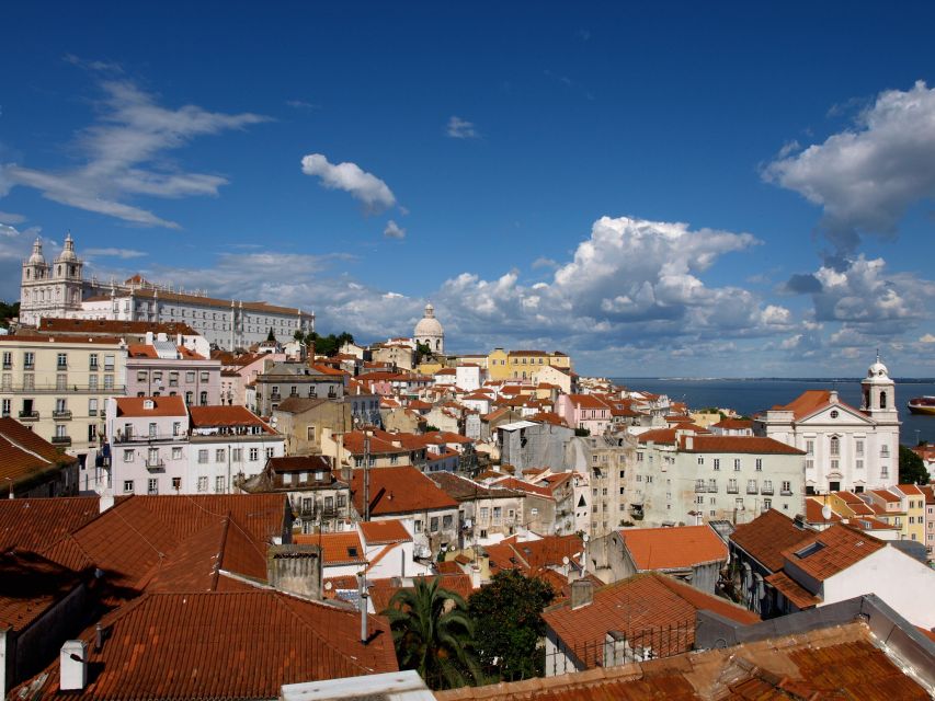 Full city of Lisbon on board of a private car - Christ the King adds a cross-river perspective