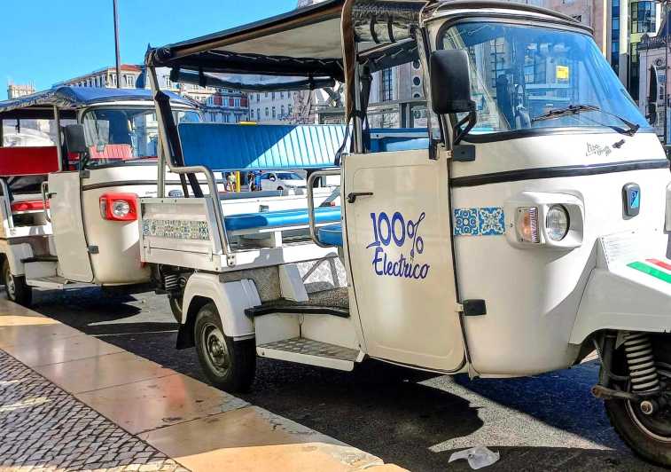 Guided Electric Piaggio Tuk-Tuk Tour of Historic Lisbon - Baixa opens the story at street level