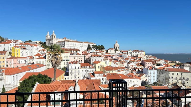 Lisboa: Tuk Tuk ride in Alfama & pick-up you at the hotel. - Crossing Baixa on the way uphill