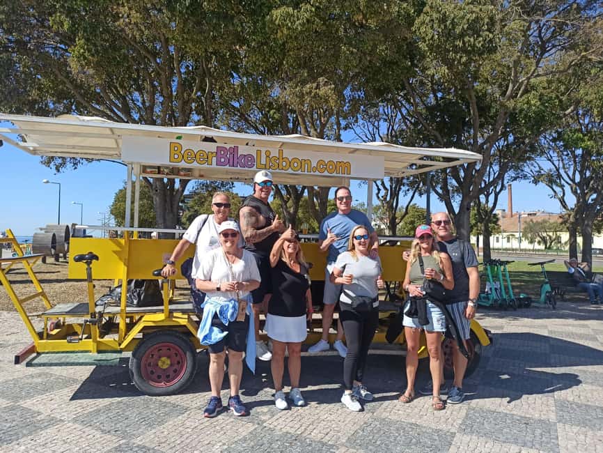 Lisbon: 1-Hour Beer or Sangria Bike Sightseeing Tour - Pedaling past 25 de Abril Bridge