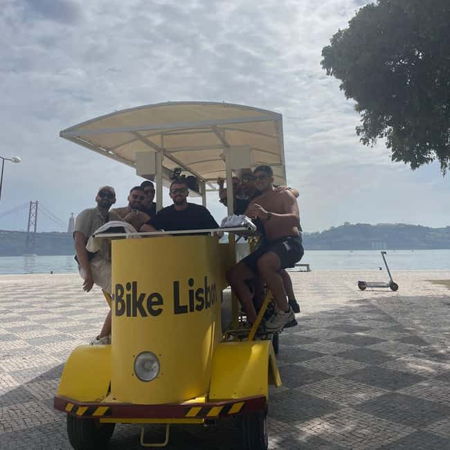 Lisbon: 1-Hour Beer or Sangria Bike Sightseeing Tour - Drinks, music, and the onboard bar