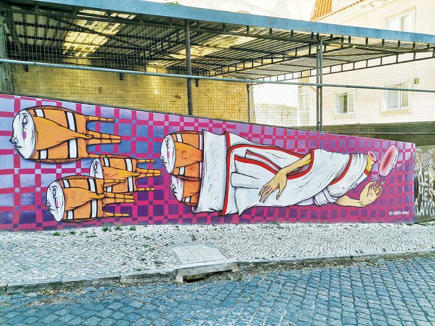 Lisbon: 2-Hour Street Art Photo Tour - The climb toward Lisbon’s castle hill