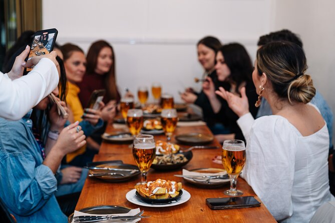 Lisbon: Award-Winning Guided Walking Food Tour with Local Drinks - Sardines and seafood rice on Rua da Vitória