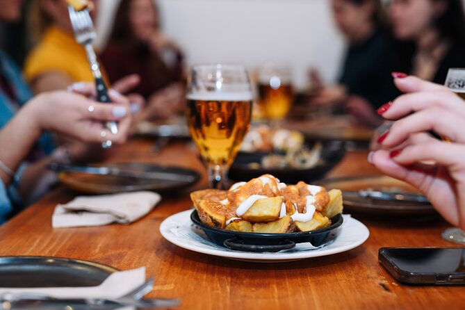 Lisbon: Award-Winning Guided Walking Food Tour with Local Drinks - Pastel de nata at Restauradores Square