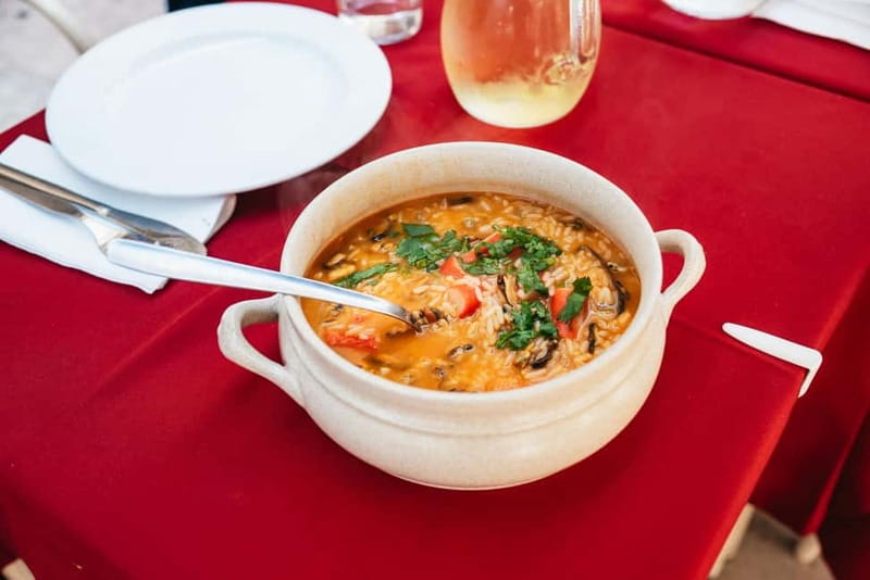 Lisbon: Baixa District Food Tour with Dinner and Drinks - Praça Dom Pedro IV and Rossio between bites