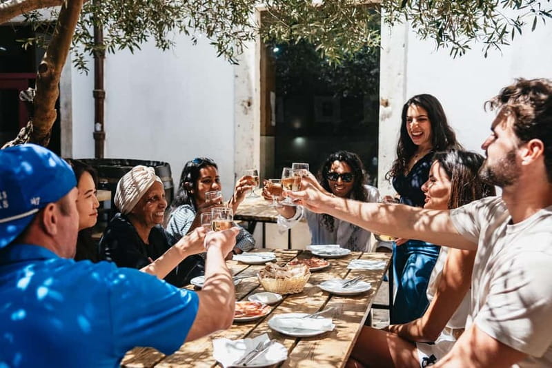 Lisbon: Baixa District Food Tour with Dinner and Drinks - St. Dominic’s Square and the city’s harder stories