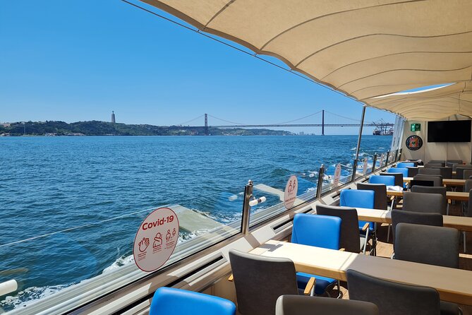 Lisbon Boat ride on Tagus river - A quiet boat with a bar