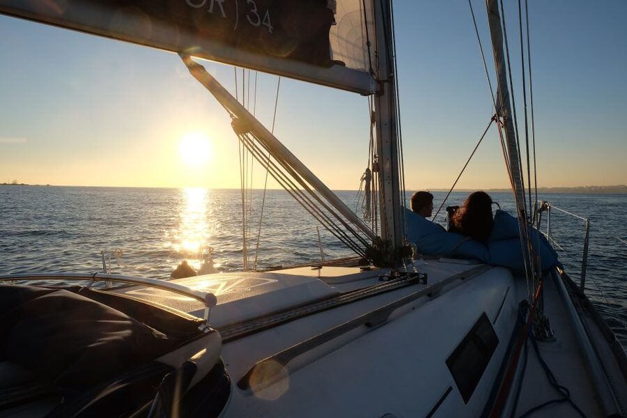 Lisbon: City Skyline Sailboat Cruise with Drink and Snacks - Crossing toward Cacilhas and Cristo Rei