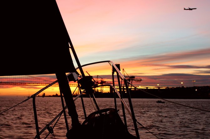 Lisbon: Daylight or Sunset on a Vintage Sailboat - Leaving under the 25 de Abril Bridge