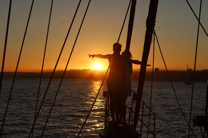 Lisbon: Daylight or Sunset on a Vintage Sailboat - Petiscos, wine, and the changing light