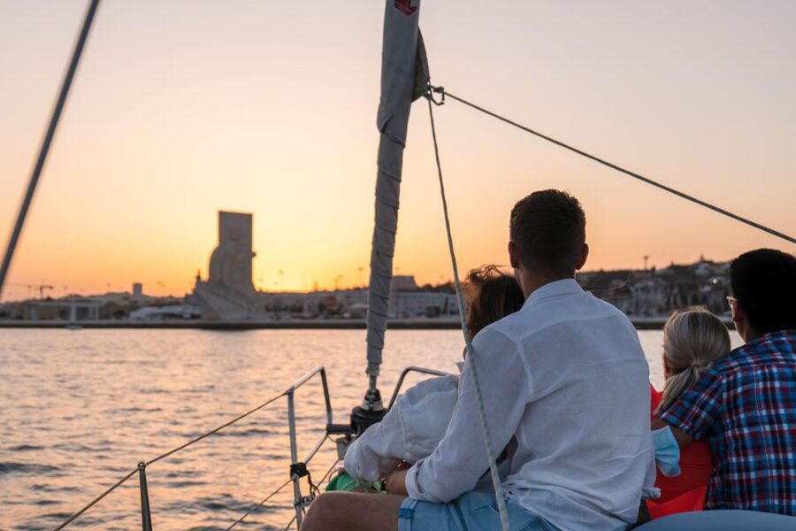 Lisbon: Daytime/Sunset/Night City Sailboat Tour with Drink - Under the 25 de Abril Bridge
