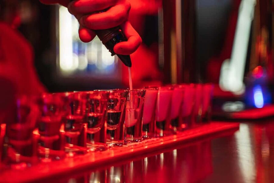 Lisbon: Drunken History Walking Tour with Included Drinks - Walking into Bairro Alto’s nightlife