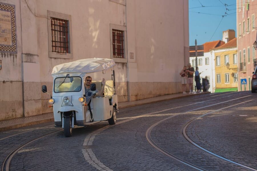 Lisbon: Early Morning TukTuk Tour - hotel/cruise ship pickup - Chiado, Bica, and Bairro Alto