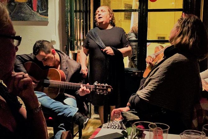 Lisbon Fado Experience: Walking Tour, Dinner and Live Music Show - Dinner in a traditional Fado house