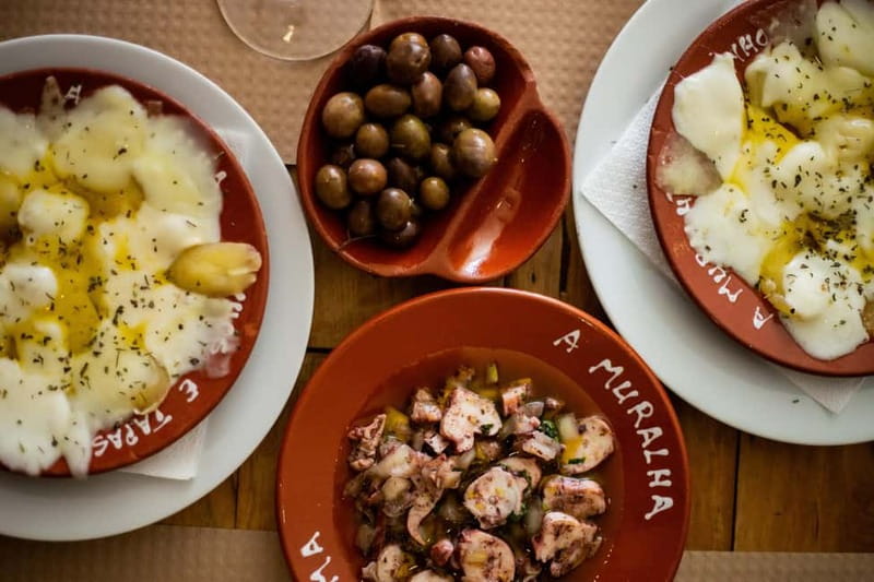 Lisbon: Food Tasting Tour by Tuk Tuk with 2 Stops - Alfama brings the strongest local flavor