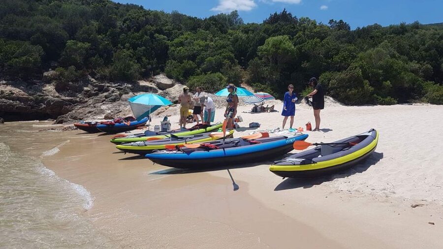 Lisbon: Full-Day Kayak Tour with Picnic and Transfer - Reaching a Beach Seen Best from the Water