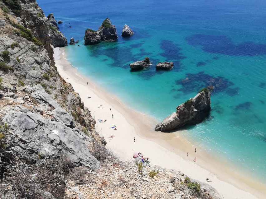 Lisbon: Full-Day Sesimbra Kayak Tour with Picnic - Guides, instruction, and group atmosphere