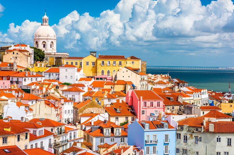 Lisbon: Guided Bike Tour, Helicopter Flight, and Boat Trip - Returning by boat along the Tagus