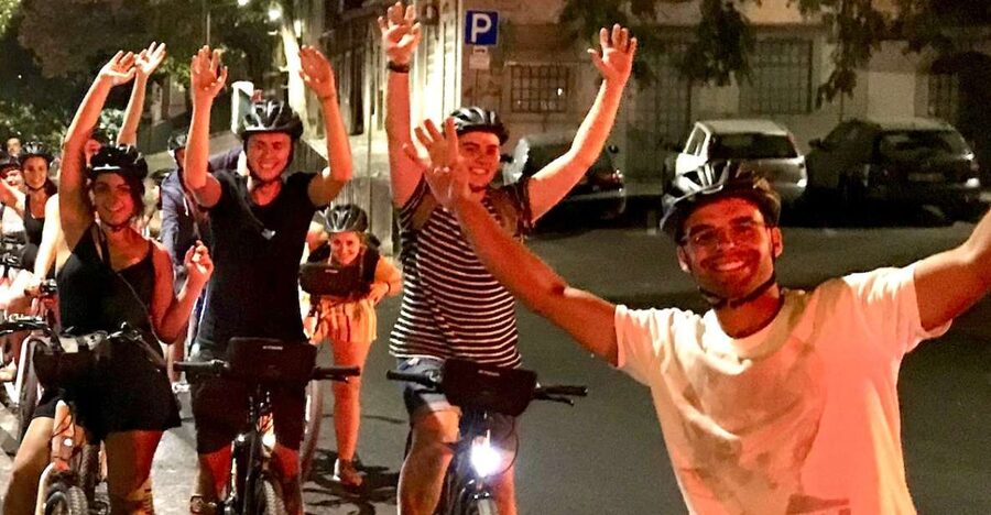 Lisbon: Guided Nighttime Electric Bike Tour - The red sun and the first city lights