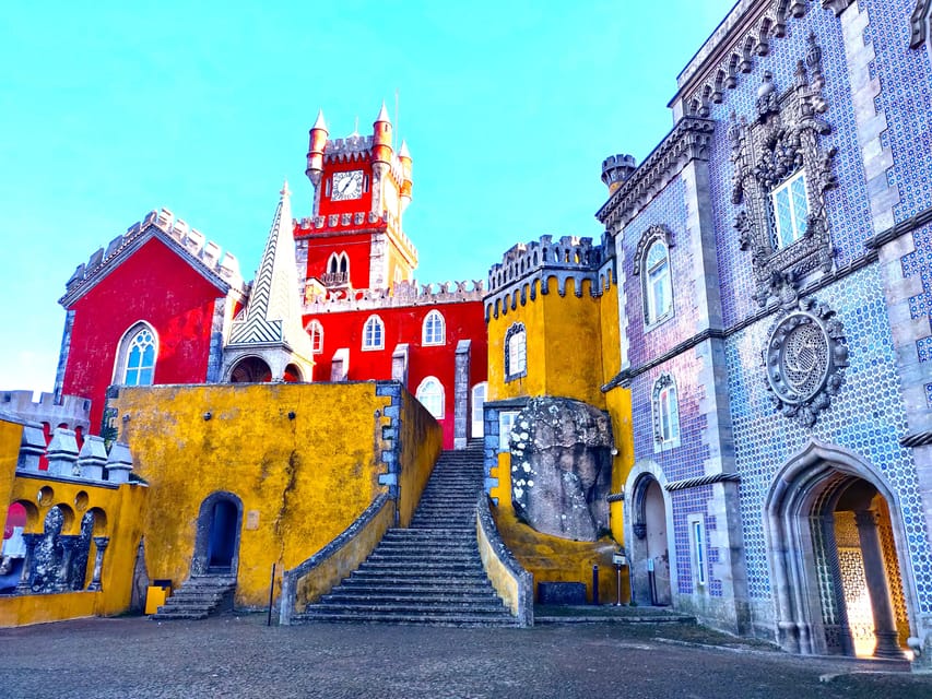 Lisbon: Half-Day Sintra Tour with Pena Palace and Regaleira - Pena Palace terraces and the first big views