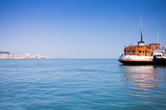 Lisbon Hidden Gems Walk: Traditions, Lunch and Ferry ride - Lunch in Cacilhas with seafood rice