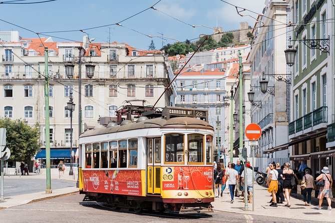 Lisbon: Hop-On Hop-Off Tour Bus with Three Routes Including Tram - The Hills Tram shows old Lisbon from the street
