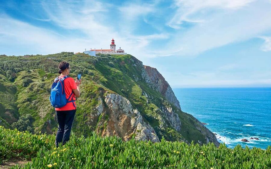 Lisbon: Pena Palace, Sintra, Cabo da Roca & Cascais Day Tour - Pena Palace, color above the Sintra hills