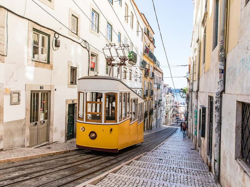 Lisbon: Private Guided Tour by Electric Tuk Tuk - Starting in Rossio and climbing toward the old city