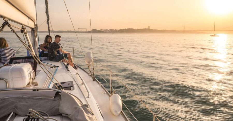 Lisbon: Private Sunset Cruise on the Tagus River with Drink - Sailing east beneath the 25 de Abril Bridge