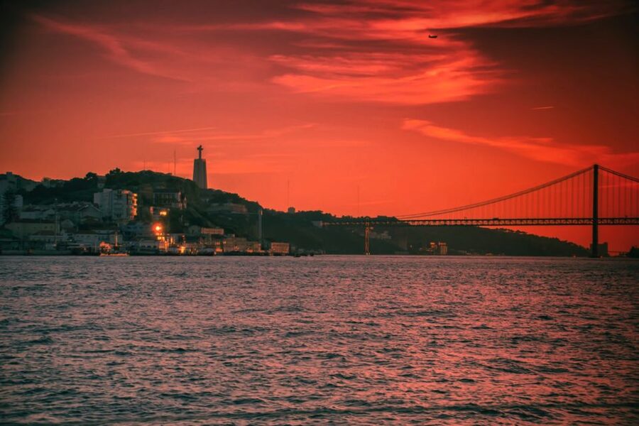 Lisbon: Sailboat Tour w/ Local Guide and Open Bar Green Wine - Boarding beneath the 25 de Abril Bridge