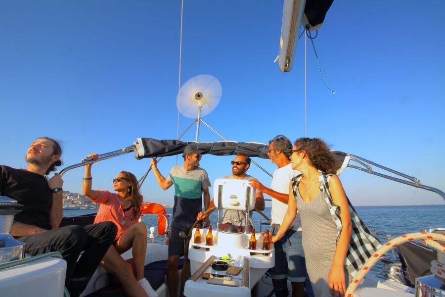 Lisbon: Sailing Tour with Wine and Snacks - Under the 25 de Abril Bridge