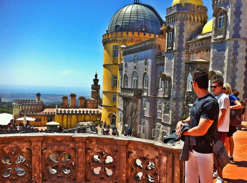 Lisbon: Sintra & Pena Palace Guided Tour with Hotel Pickup - Sintra town: pastries, shops, and a royal palace
