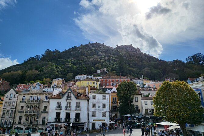 Lisbon: Sintra, Regaleira, Pena, Cabo Roca All Tickets Included - Pena Palace: color, height, and a busy visit