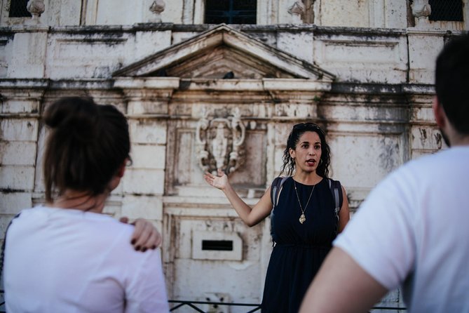 Lisbon Small-Group Food Tour with 18 Tastings in Alfama District - Walking through Chafariz d’El Rei and old Alfama