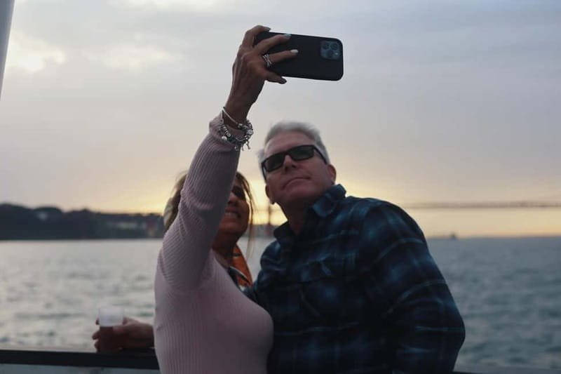 Lisbon: Sunset Boat Tour with Music and Drinks - Music, dancing, and the onboard mood
