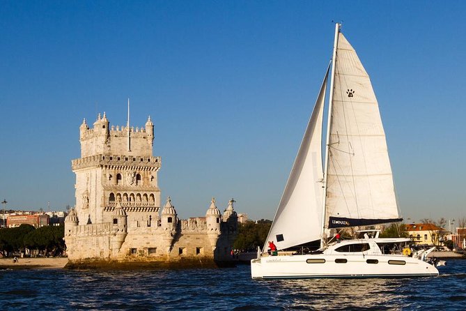 Lisbon: Sunset Cruise With Drinks on Spacious Yacht - A spacious yacht with a calm rhythm