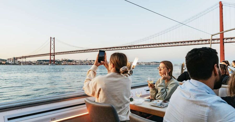 Lisbon: Sunset Cruise with Welcome Drink and Snacks - A welcome drink before Lisbon turns gold