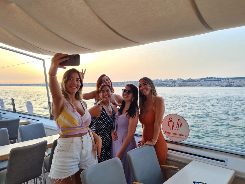 Lisbon: Sunset Cruise with Welcome Drink and Snacks - Passing beneath the 25 April Bridge