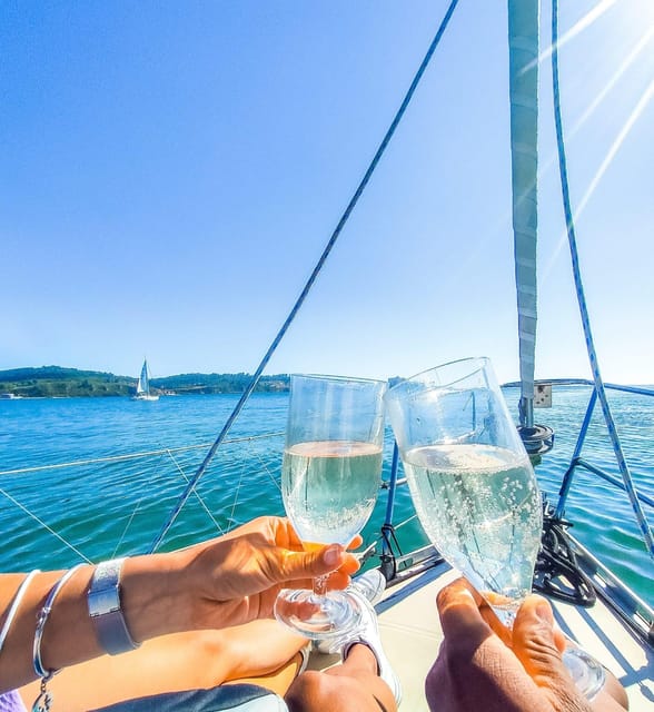 Lisbon: "Sunset" & "Day Tours" by boat, with drink and music - Why Lisbon looks better from the Tagus