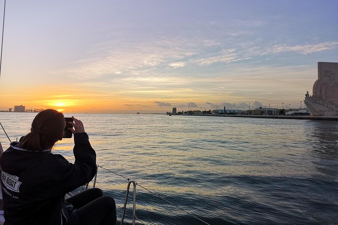 Lisbon Sunset Sailing Tour on Luxury Sailing Yacht with 2 Drinks - Wine, beer, cheese, and sunset