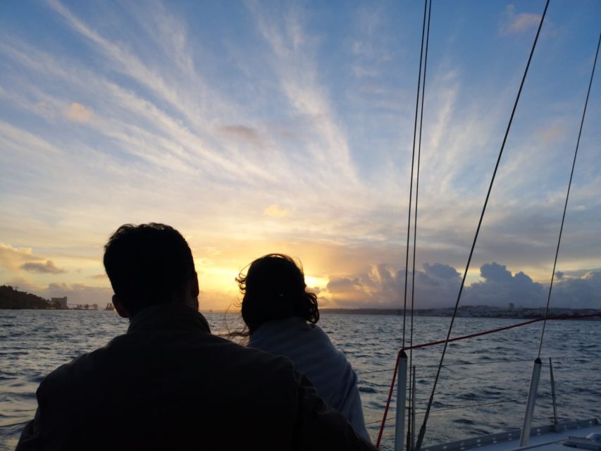 Lisbon: Sunset Sailing with Portuguese Wine and History - Languages, group style, and who will enjoy it most